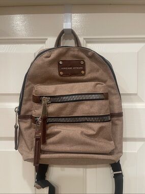 Adrienne Vittadini Tan Canvas Backpack with Brown Trim 12”W 12”H